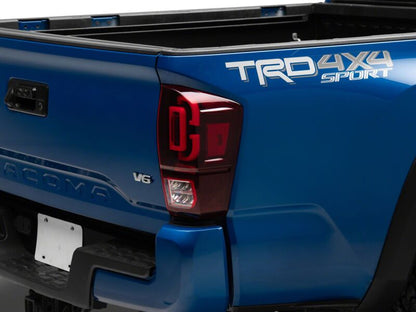 Raxiom 16-23 Toyota Tacoma XW Series Sequential LED Tail Lights- Black Housing- Red Lens