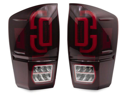 Raxiom 16-23 Toyota Tacoma XW Series Sequential LED Tail Lights- Black Housing- Red Lens