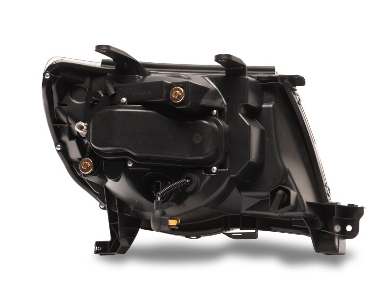 Raxiom 05-11 Toyota Tacoma Axial Series Switchback Projector Headlights- Black Housing- Clear Lens