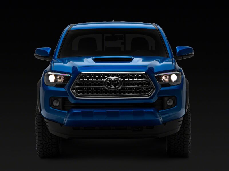 Raxiom 16-23 Toyota Tacoma Axial Series OE Replacement Headlights- Black Housing- Clear Lens