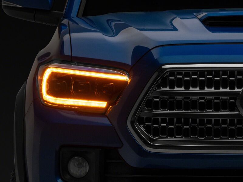 Raxiom 16-23 Toyota Tacoma CXR Series V2 LED Projector Headlights- Black Housing- Clear Lens