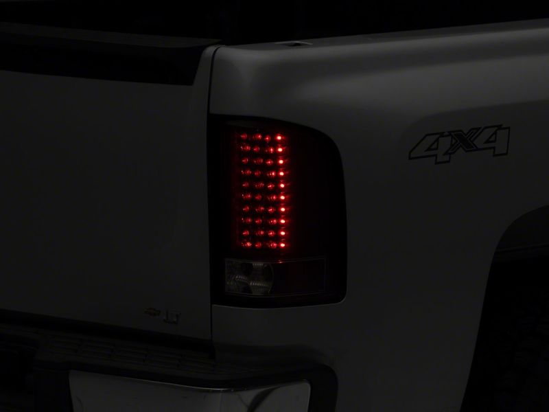 Raxiom 07-13 Chevrolet Silverado 1500 LED Tail Lights- Black Housing (Clear Lens)