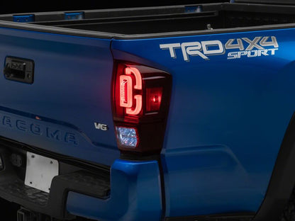 Raxiom 16-23 Toyota Tacoma XW Series Sequential LED Tail Lights- Black Housing- Red Lens