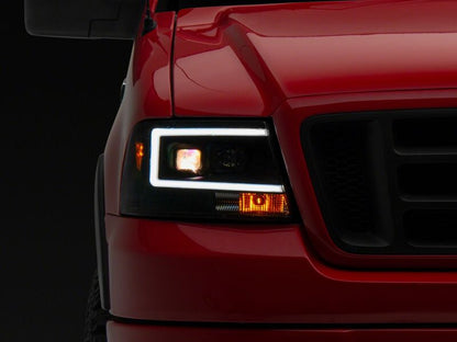 Raxiom 04-08 Ford F-150 Axial Series Projector Headlights- Black Housing- Clear Lens
