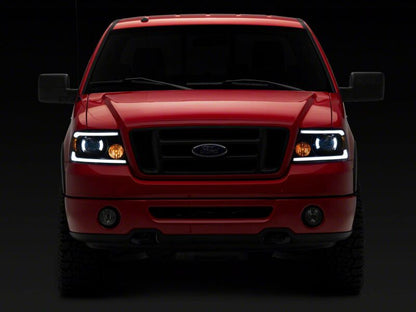 Raxiom 04-08 Ford F-150 Axial Series Projector Headlights with LED Bar- Black Housing- Clear Lens