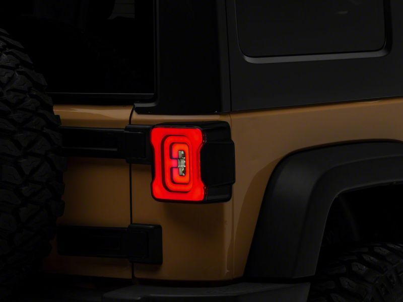 Raxiom 07-18 Jeep Wrangler JK Axial Series LED Tail Lights- Black Housing (Smoked Lens)