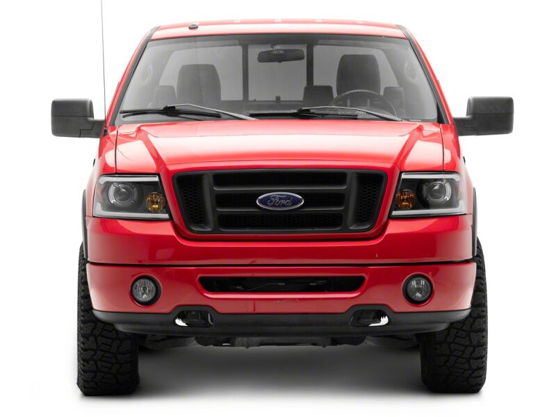 Raxiom 04-08 Ford F-150 Axial Series Projector Headlights with LED Bar- Black Housing- Clear Lens