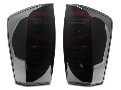 Raxiom 16-23 Toyota Tacoma ST LED Tail Lights- Black Housing- Smoked Lens