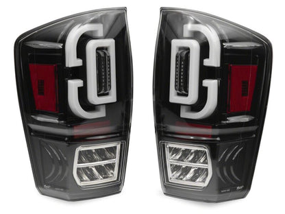 Raxiom 16-23 Toyota Tacoma XW Series Sequential LED Tail Lights- Black Housing- Clear Lens