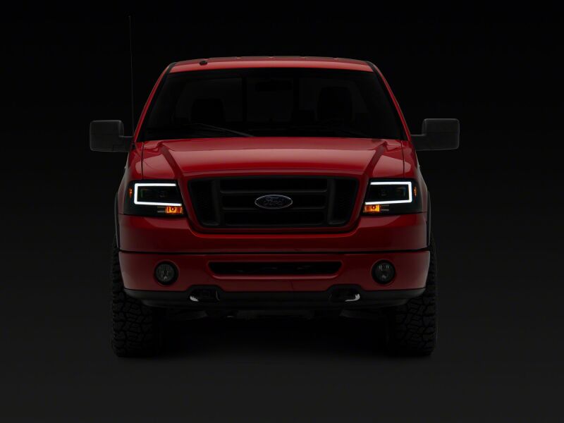 Raxiom 04-08 Ford F-150 Axial Series Projector Headlights- Black Housing- Clear Lens