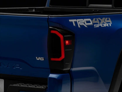 Raxiom 16-23 Toyota Tacoma Axial Series LED Tail Lights- Black Housing- Smoked Lens