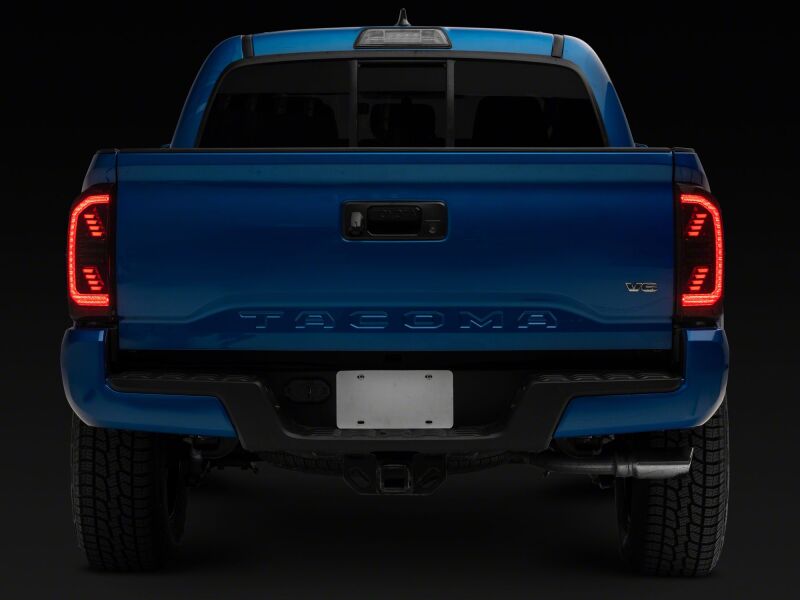 Raxiom 16-23 Toyota Tacoma LED Tail Lights- Black Housing- Clear Lens