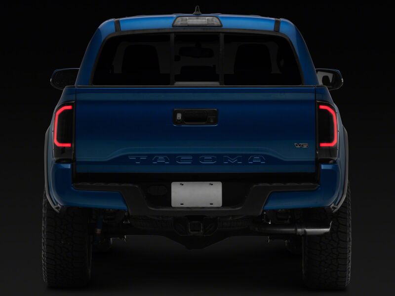 Raxiom 16-23 Toyota Tacoma Axial Series LED Tail Lights- Black Housing- Smoked Lens
