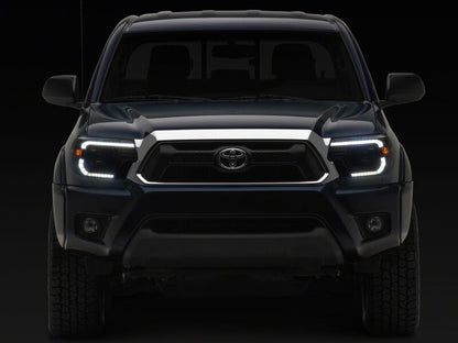 Raxiom 12-15 Toyota Tacoma Axial Series Switchback Projector Headlights- Black Housing- Clear Lens