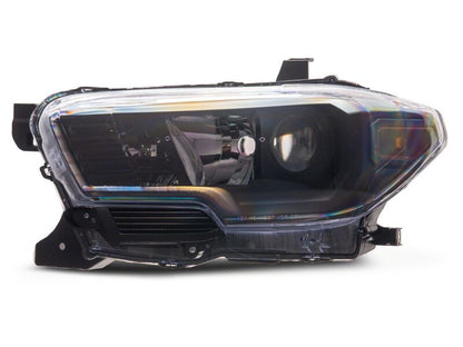 Raxiom 16-23 Toyota Tacoma Axial Series OE Replacement Headlights- Black Housing- Clear Lens