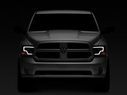 Raxiom 09-18 Dodge RAM 1500 LED Bar Headlights- Black Housing (Clear Lens)