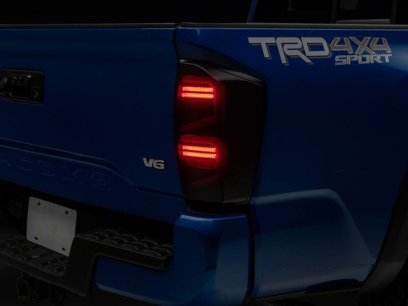 Raxiom 16-23 Toyota Tacoma ST LED Tail Lights- Black Housing- Smoked Lens