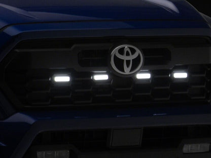 Raxiom 24-26 Toyota Tacoma Pre Runner/TRD Off-Road/TRD Sport White LED Grille Light- Smoked Lens