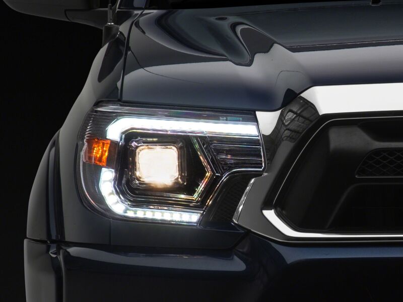 Raxiom 12-15 Toyota Tacoma Axial Series Switchback Projector Headlights- Chrome- Clear Lens
