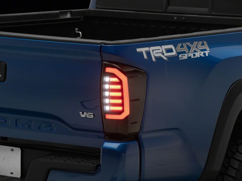 Raxiom 16-23 Toyota Tacoma LDS Series LED Tail Lights- Black Housing- Smoked Lens