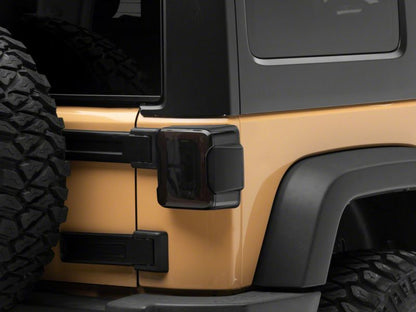 Raxiom 07-18 Jeep Wrangler JK Axial Series LED Tail Lights- Black Housing (Smoked Lens)