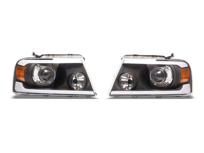 Raxiom 04-08 Ford F-150 Axial Series Projector Headlights with LED Bar- Black Housing- Clear Lens