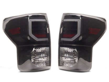 Raxiom 07-13 Toyota Tundra Axial Series Dual C-Shape LED Tail Lights- Black Housing- Smoked Lens