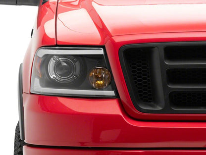 Raxiom 04-08 Ford F-150 Axial Series Projector Headlights with LED Bar- Black Housing- Clear Lens