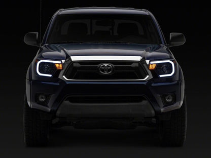 Raxiom 12-15 Toyota Tacoma Axial Series Headlights/Seq LED Bar- Black- Clear Lens