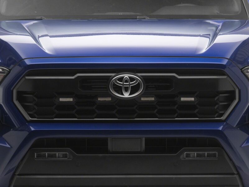Raxiom 24-26 Toyota Tacoma Pre Runner/ TRD Off-Road/ TRD Sport White LED Grille Light- Clear Lens