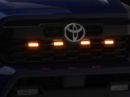 Raxiom 24-26 Toyota Tacoma Pre Runner/TRD Off-Road/TRD Sport Amber LED Grille Light- Smoked Lens