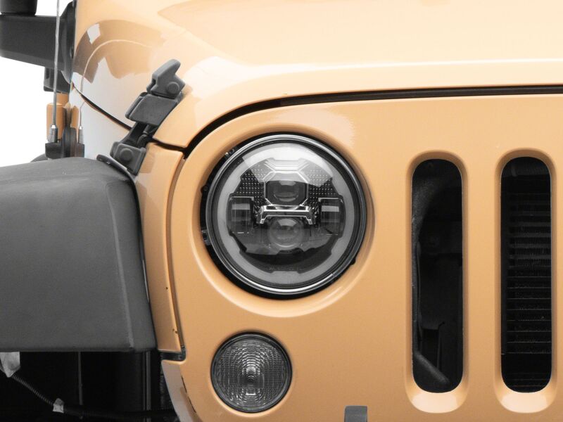 Raxiom 07-18 Jeep Wrangler Axial Series 7-Inch LED Headlights w DRL/ Black Housing - Clear Lens