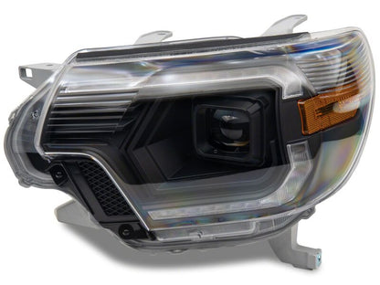 Raxiom 12-15 Toyota Tacoma Axial Series Switchback Projector Headlights- Black Housing- Clear Lens