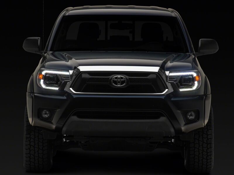 Raxiom 12-15 Toyota Tacoma Axial Series Switchback Projector Headlights- Chrome- Clear Lens